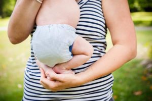 a woman learning how to find a lactation consultant